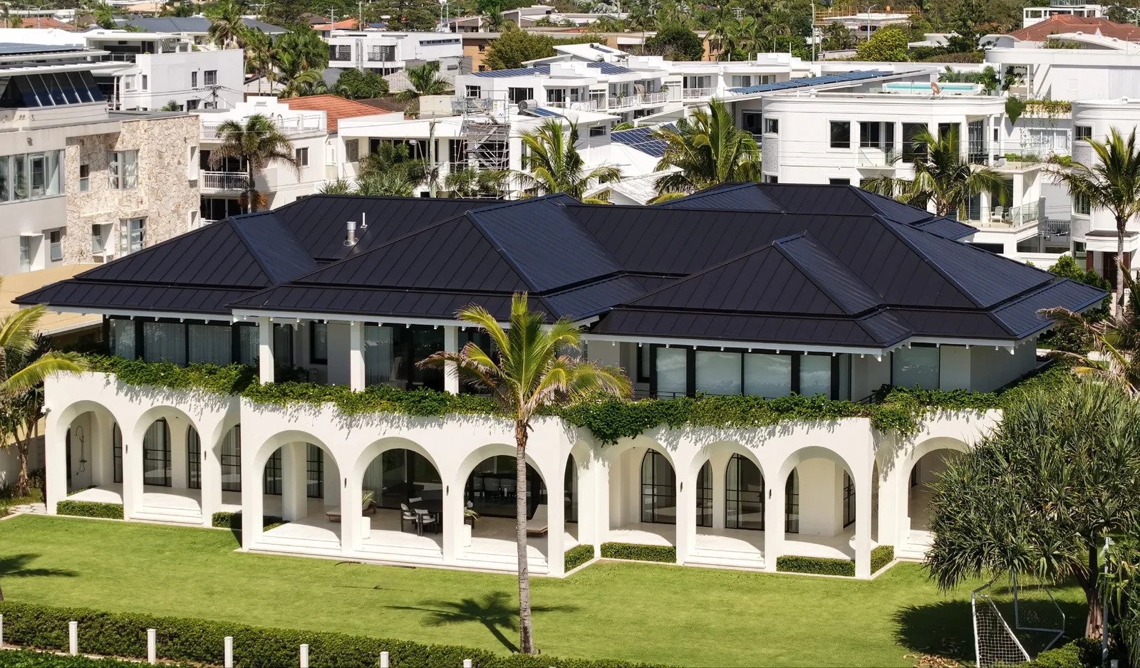 Mermaid Beach Heron Ave — aerial of the Matte Dark Bronze aluminium standing seam roof above the beach by Euroclad, Gold Coast QLD