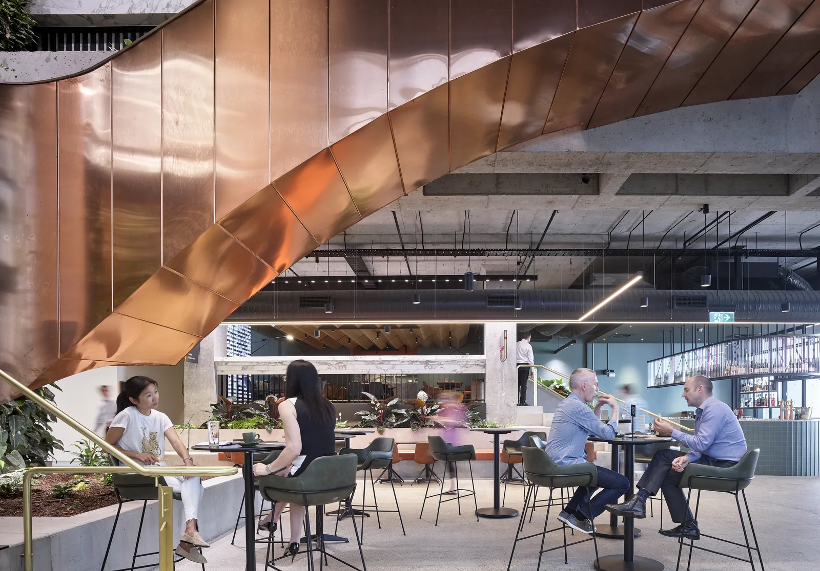 Copper flat-lock soffit sweeping over the Central Plaza One lobby, Brisbane — folded and installed by Euroclad
